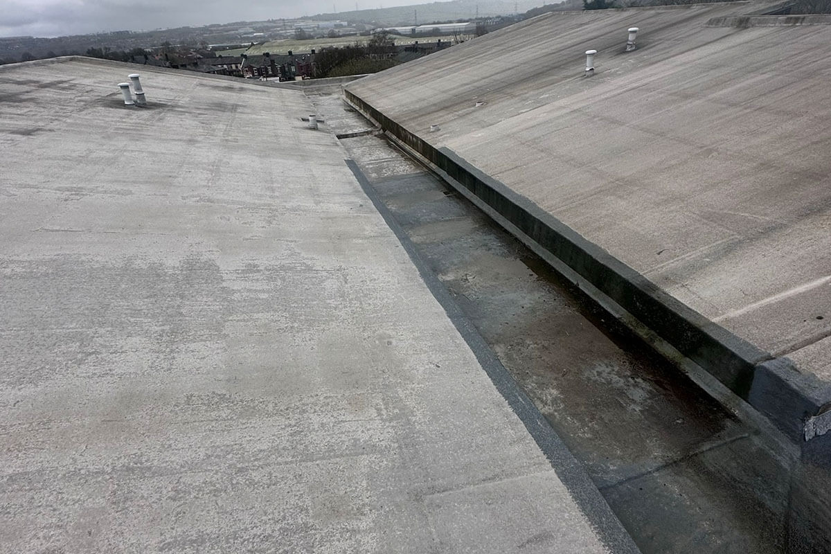 Old damp damage roof before liquid roofing lees court anchor